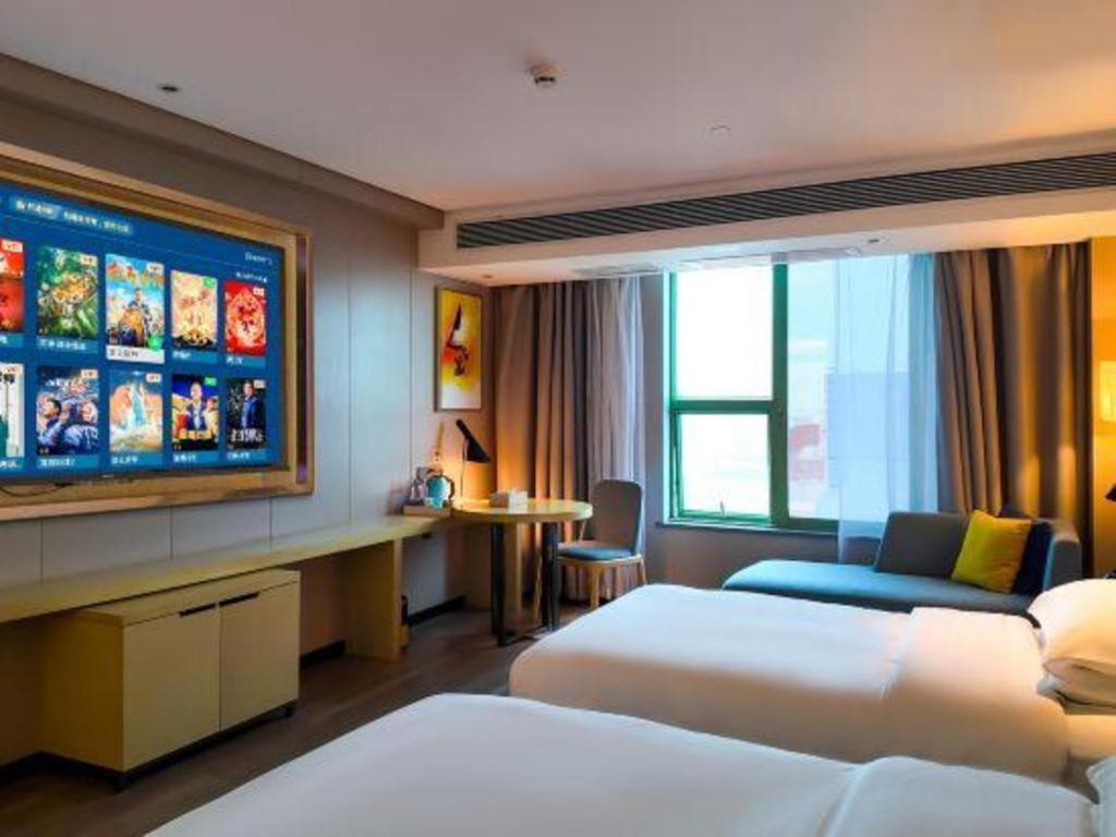 Echarm Hotel Yangjiang Baili Plaza Exterior foto