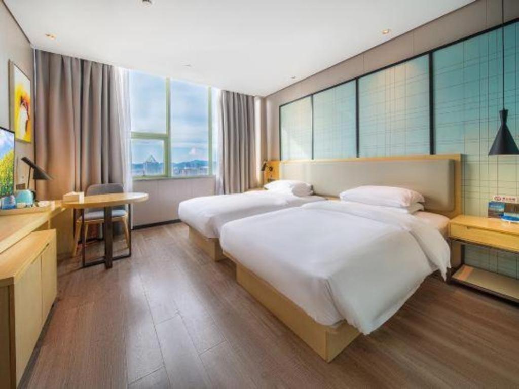 Echarm Hotel Yangjiang Baili Plaza Exterior foto