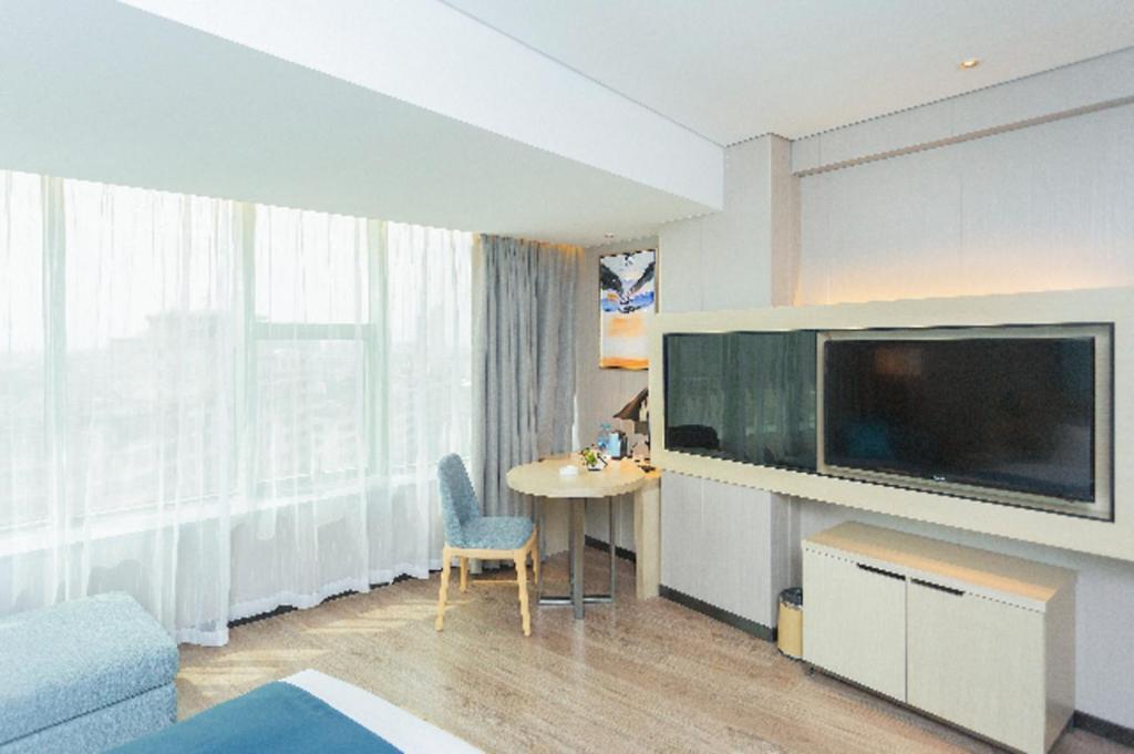Echarm Hotel Yangjiang Baili Plaza Exterior foto