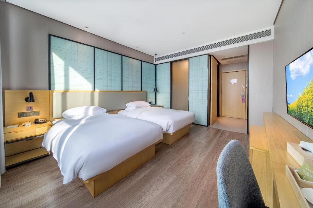 Echarm Hotel Yangjiang Baili Plaza Exterior foto
