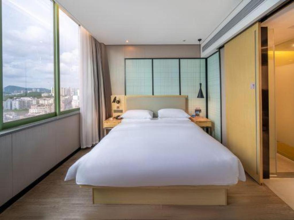 Echarm Hotel Yangjiang Baili Plaza Exterior foto