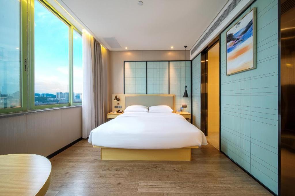 Echarm Hotel Yangjiang Baili Plaza Exterior foto