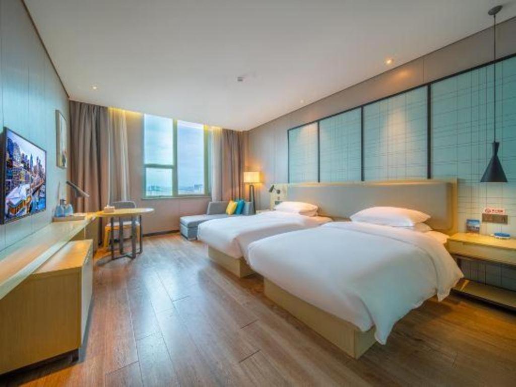 Echarm Hotel Yangjiang Baili Plaza Exterior foto
